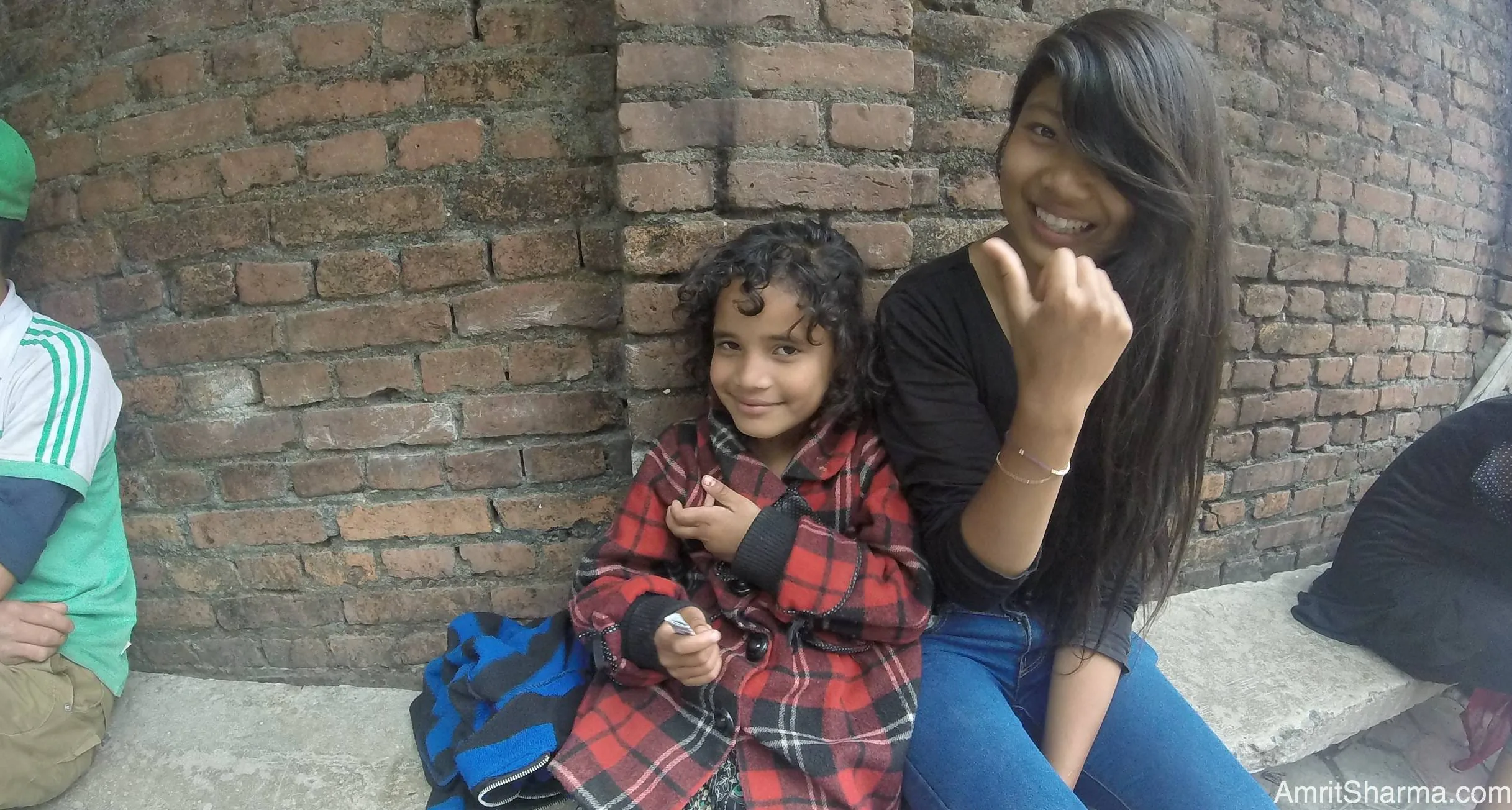 “Can I take your photo?” I asked her in Nepali.