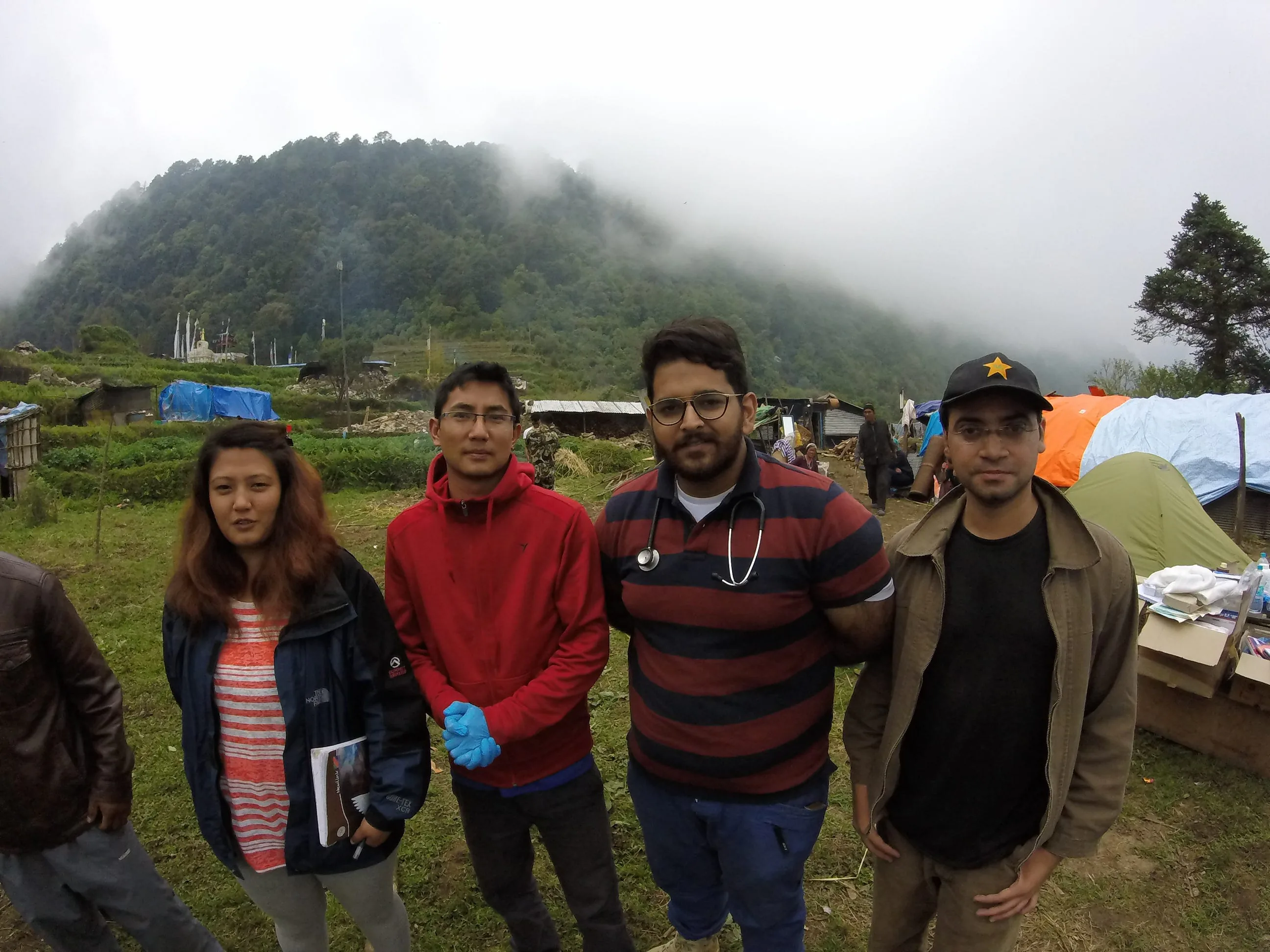 Dr. Talha Rehman (stripes) and his team running Medical Camp.