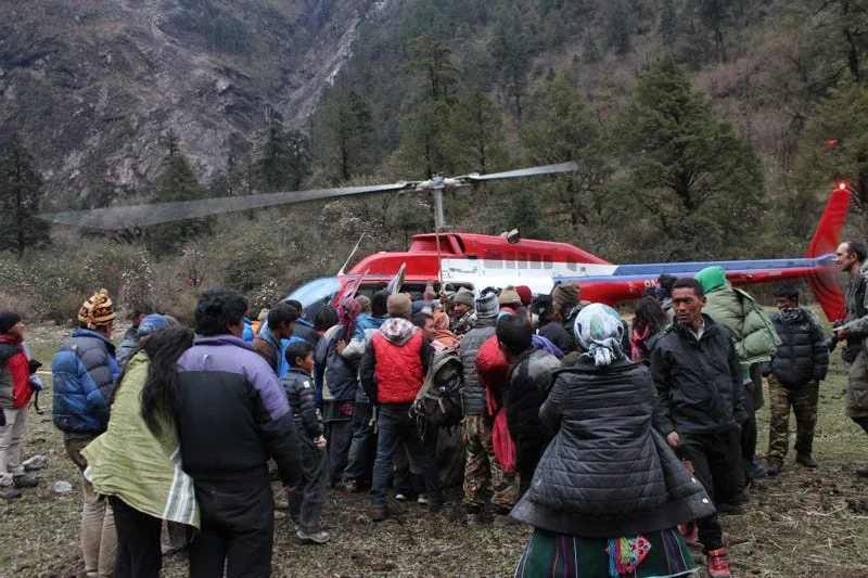 Helicopter with supplies in Rasuwa District. Photo Credit: Austin Lord.