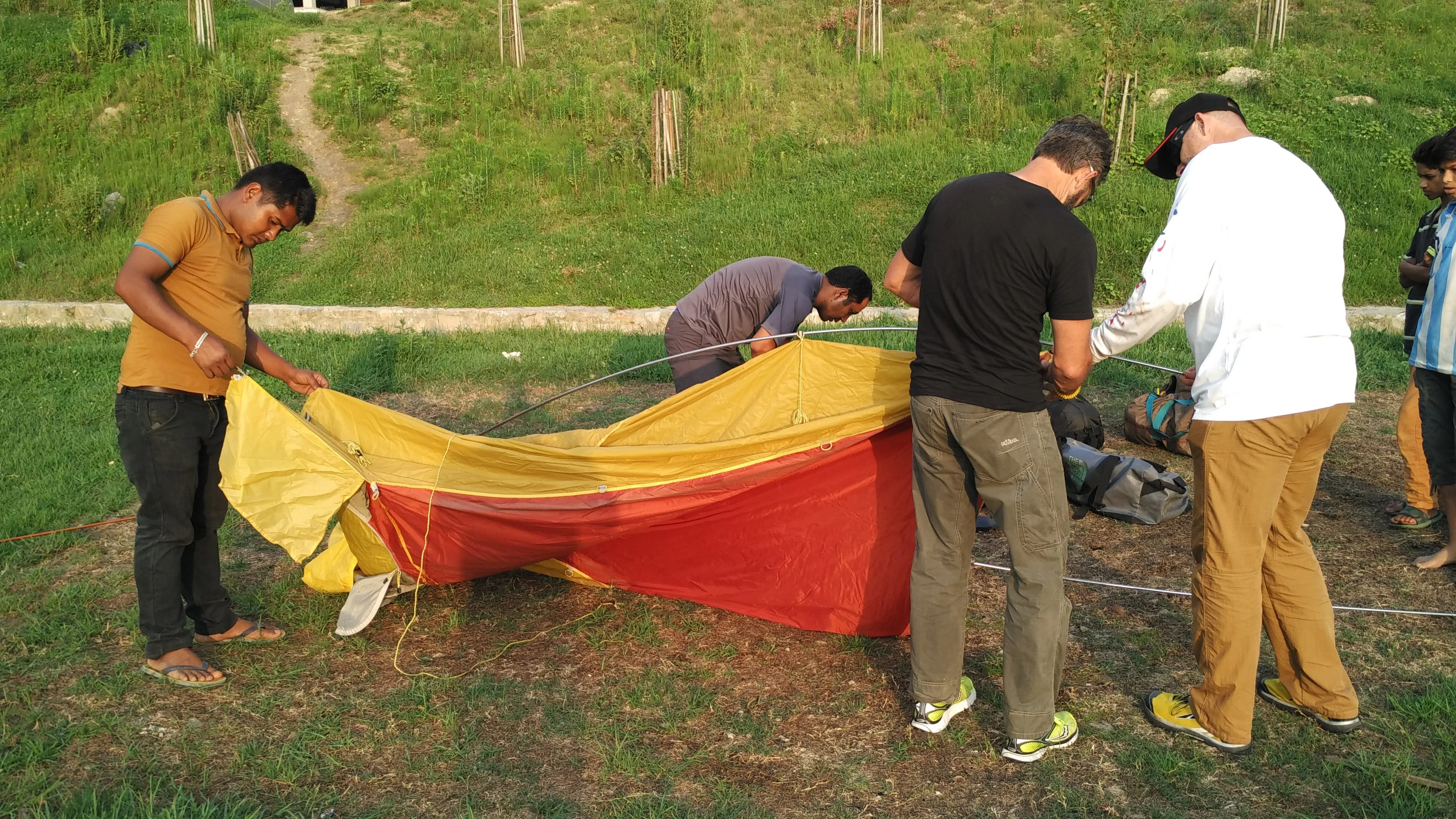 How many people does it take to setup a tent? We fumbled about quite a bit before we figured this one out.